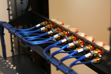 Low-current rack of electronic equipment for the Internet and multiroom. Connecting wires using connectors and jacks.