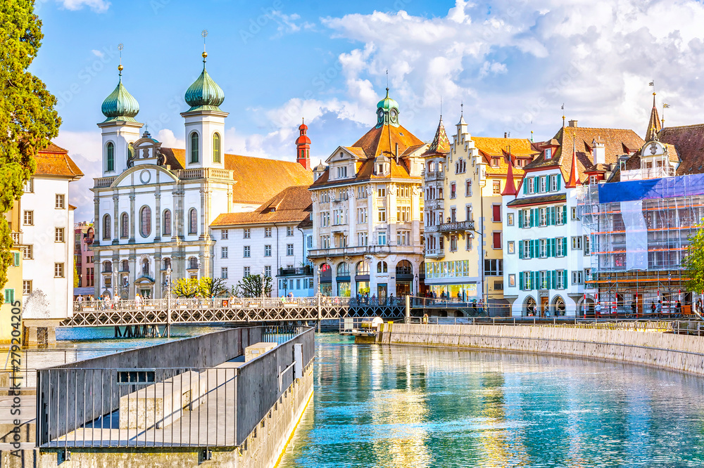 Wall mural View of Jesuit Church from river Reuss in Lucerne city in Switzerland