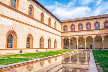 Courtyard of the ancient castle Castello Sforzesco (Sforza Castle) in the historic center of Milan, Italy