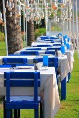 Dinner under palm trees. Beautiful Beach Resort in the Mediterranean. Kemer, Turkey.