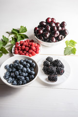 mixture variety of fresh ripe organic superfood antioxidant anfti aging food summer berries 