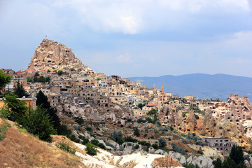 Uchisar - castle and village. Cappadocia, Central Anatolia, Turkey.