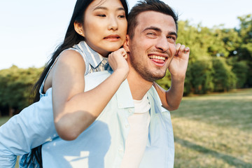 portrait of happy couple in park