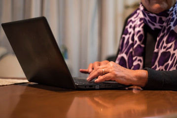  senior lady working with laptop