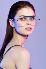 young woman with glasses