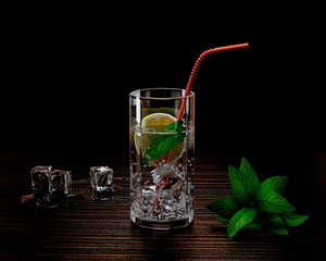 glass of water with ice and lemon