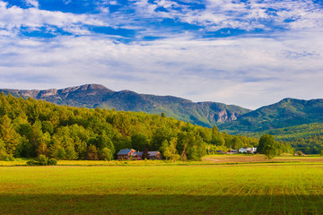 Farm landscape with Mt. Mansfield in the background, Stowe, Vermont, USA - obrazy, fototapety, plakaty