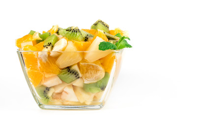 fruit salad in a plate on a white background