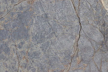 Gray stone surface with stripes. Grunge abstract stone surface. Abstract marble texture for design.
