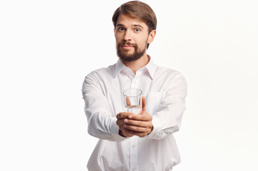 portrait of young man with glass of wine
