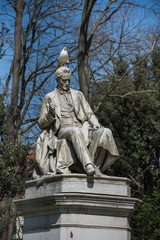 Fototapeta na wymiar Pietro Paleocapa statue in Papadopoli garden, near Venice train station ,2019 ,march