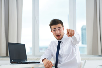 Fototapeta premium portrait of a businessman working on his laptop