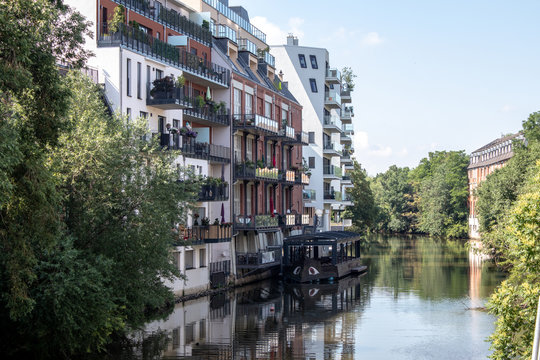View from the river Weisse Elster in Leipzig,Germany. It is a popular place to live in wonderful architecture in old Factory buildings . This is a beautiful place to live and for water sports.