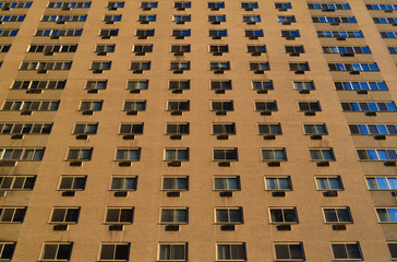 wall of windows and air conditioners