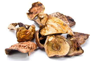 Dried mushrooms on a white background closeup. Boletus, orange-cap boletus.