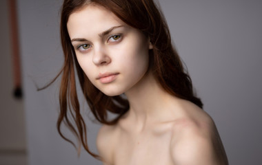 Naklejka premium Portrait of young beautiful smiling woman