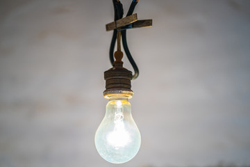 bulb with old lamp holder, energetic poverty