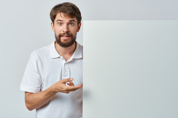 young doctor holding white board