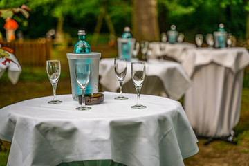 Decorated holiday table on a sunny day in the open air