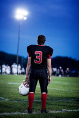 Rear view of American football player (14-15) © Cavan for Adobe