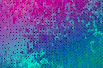 Background sequin glitter. Holiday abstract background with blinking lights.