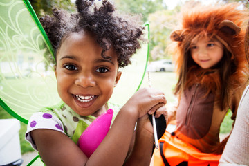 Naklejka premium Children in fancy dress costumes on Halloween