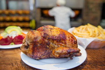 Delicious grilled chicken with french fries