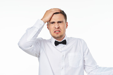 man with hands on his head isolated on white