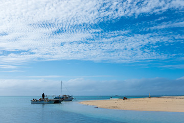 Fototapeta premium view of beach and moored boat 