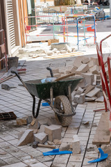 Street renovation work, stone sidewalk repair