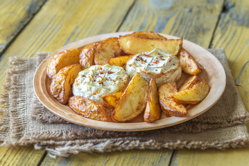Baked Camembert cheese with potato