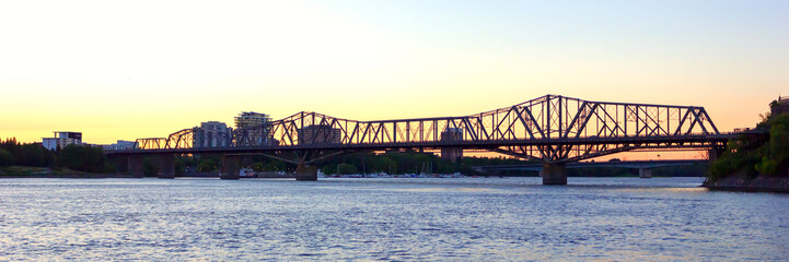 Fototapeta na wymiar bridge on Ottawa river during the sunset