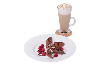 Coffee latte, chocolate pancakes stuffed with cottage cheese, raspberries. Isolated, cutout