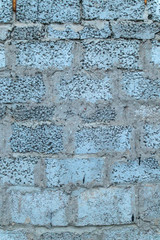 Bright deep saturated blue concrete wall bricks background