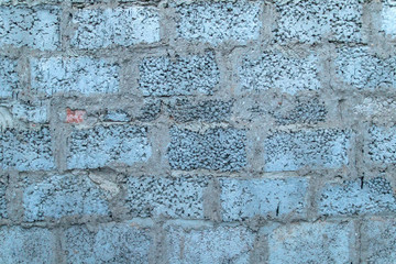Bright deep saturated blue concrete wall bricks background