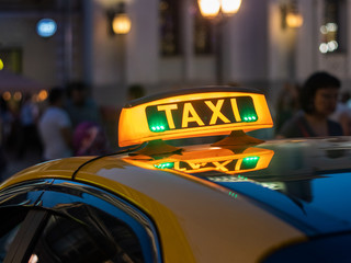 Taxi is waiting for the clients in the city center