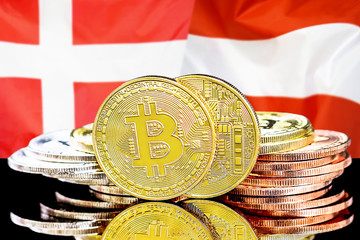 Concept for investors in cryptocurrency and Blockchain technology in the Denmark and Austria. Bitcoins on the background of the flag Denmark and Austria.