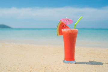 Watermelon cocktail on blue tropical summer beach in Phuket, Thailand. Summer, Vacation, Travel and Holiday concept.