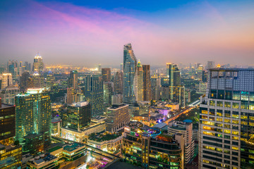 Fototapeta na wymiar Modern building in Bangkok business district at Bangkok city with skyline in night, Thailand.