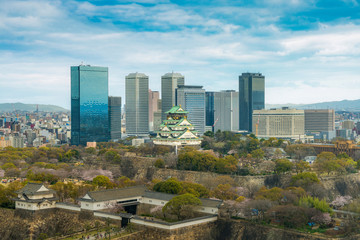 Fototapeta na wymiar Osaka Castle with Osaka business park financial district in Osaka city, Japan