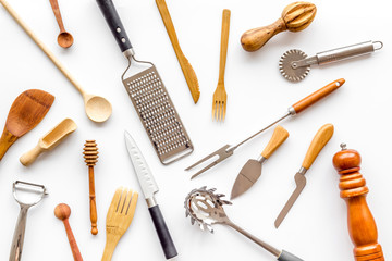 Chef work space with cookware on white background top view pattern