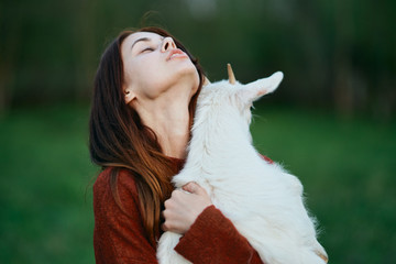 girl with her goat