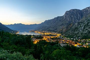 A view of kotor at sunset with a great mountain panorama