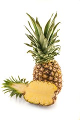 Fresh pineapple and half pineapple