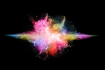 abstract colored dust explosion on a black background.abstract powder splatted background,Freeze...