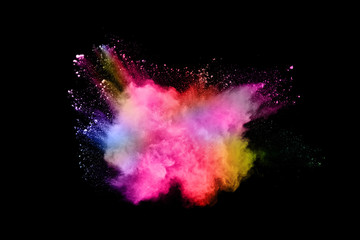 abstract colored dust explosion on a black background.abstract powder splatted background,Freeze...