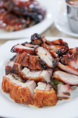 Cantonese cuisine roast duck with roast pork in the background