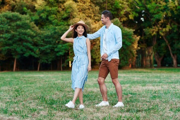 Fototapeta premium happy couple walking in the park