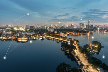 Smart city and wireless communication network concept. Digital network connection lines of Hanoi city at West Lake or Ho Tay