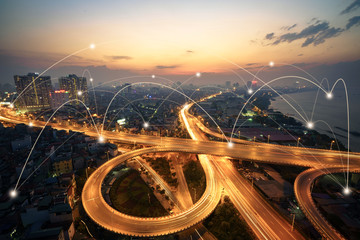 Smart city and wireless communication network concept. Digital network connection lines of Hanoi city at Vinh Tuy bridge